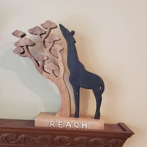 Wooden statue handmade with tree and animal